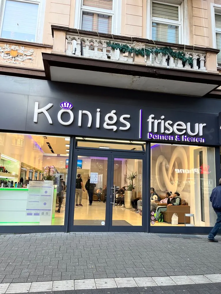 Hair salon with a large glass front on a shopping street