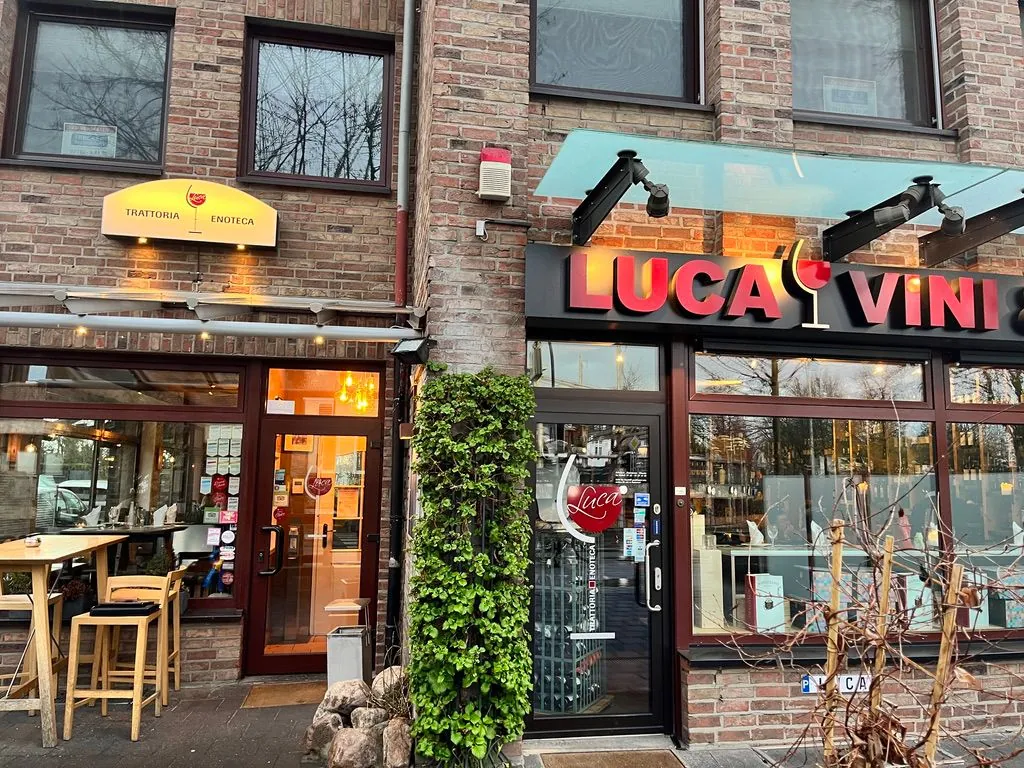 Brick facade with a restaurant and wine bar